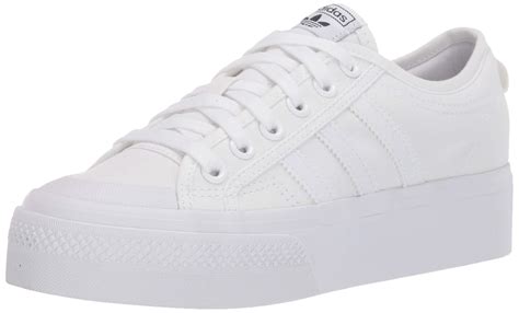 adidas white platform trainers.